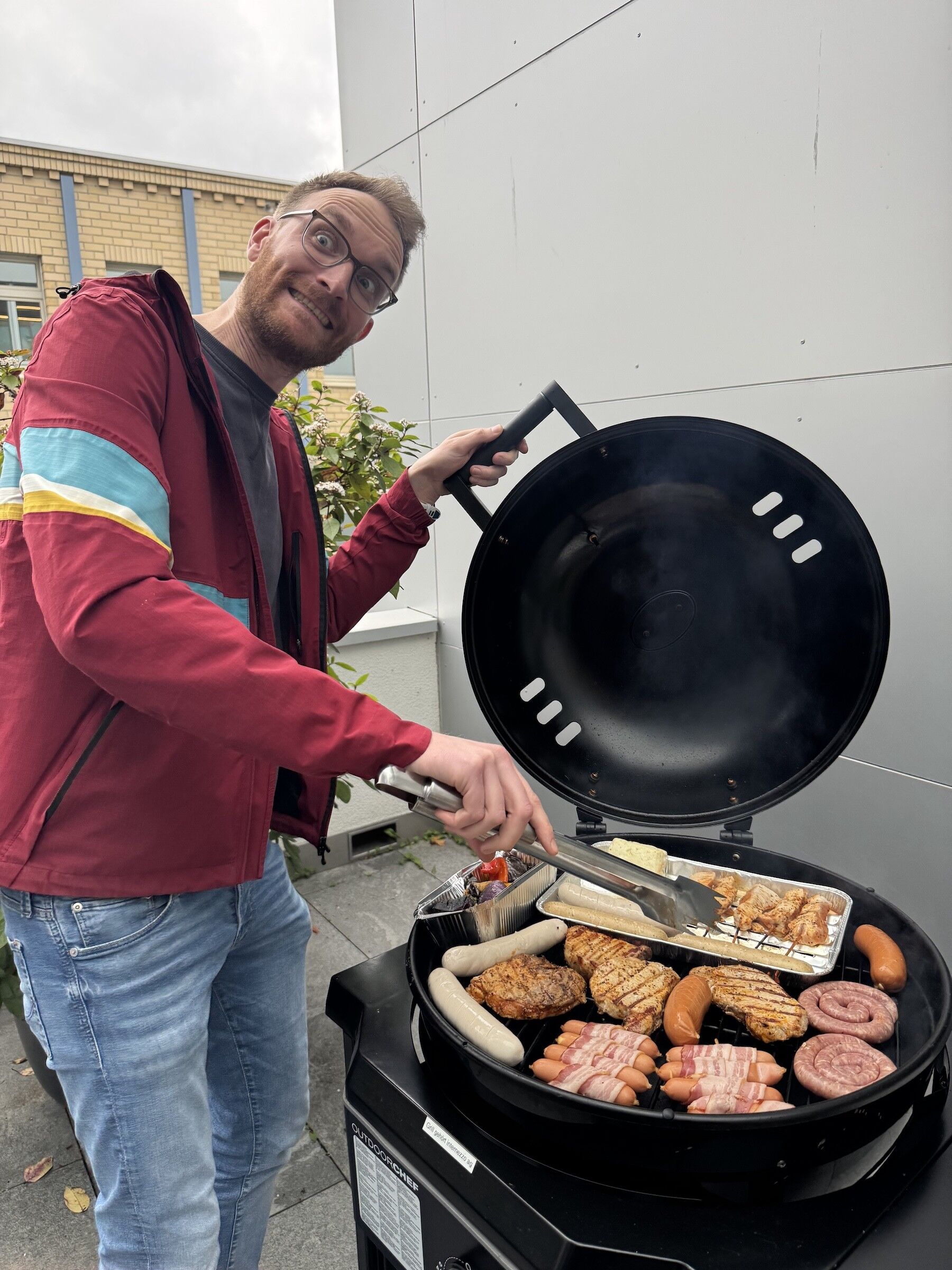 Michel taking care of the grill