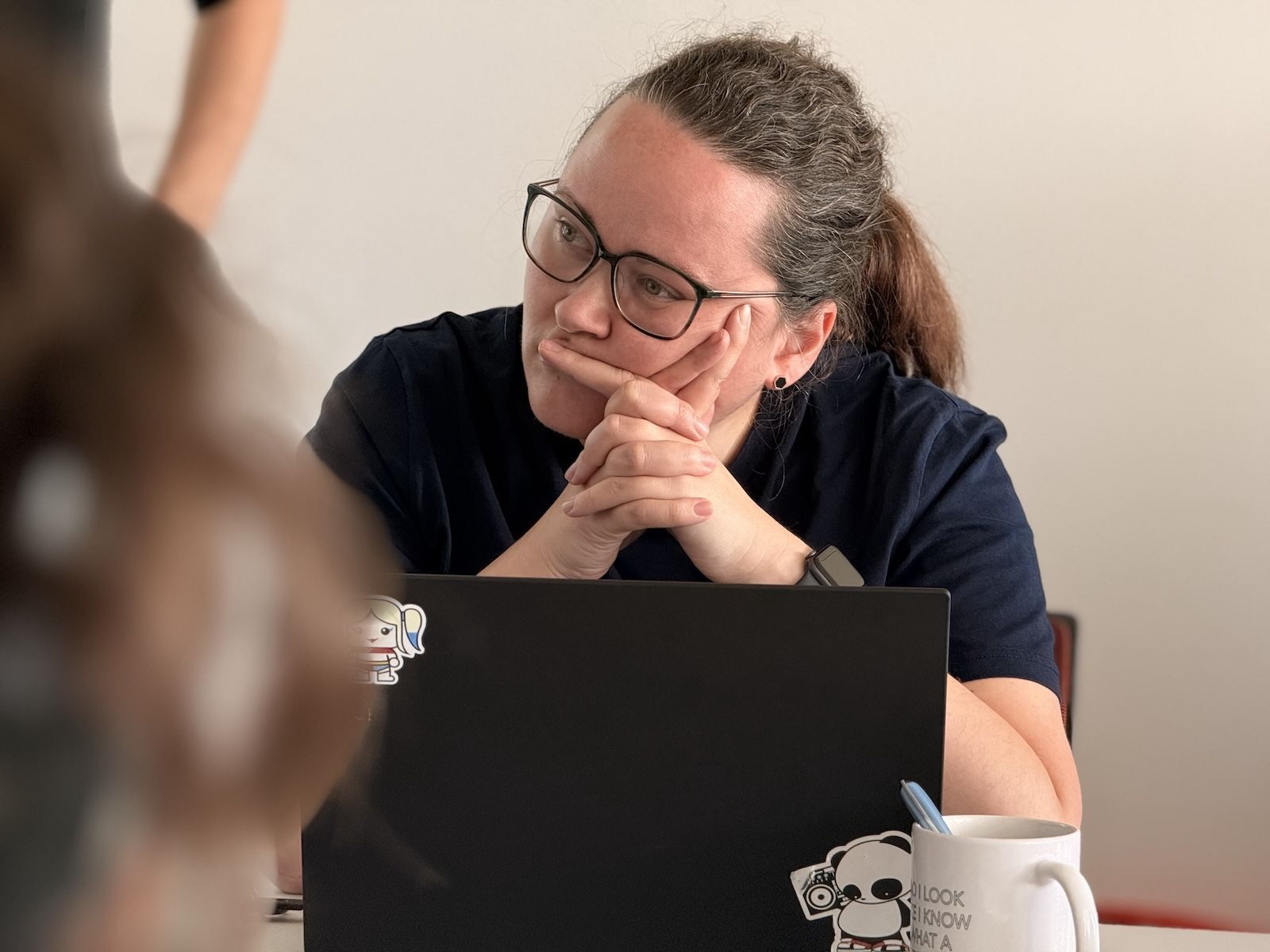 Anke listening to a discussion