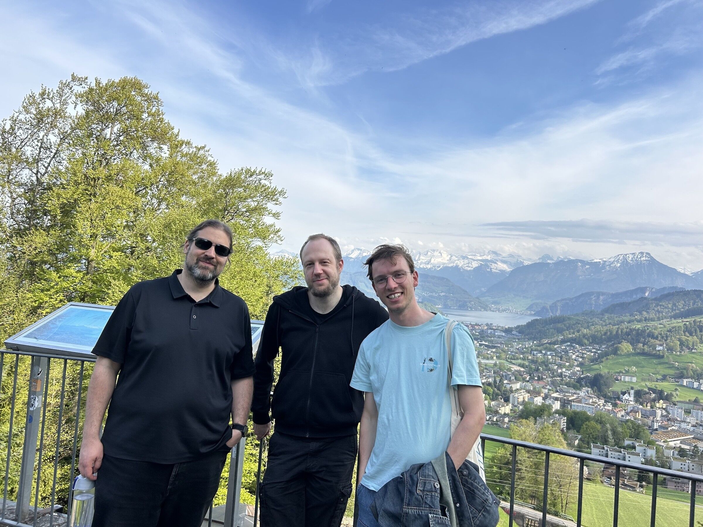 Jonas, Bernhard and Marc in front of the Swiss Alps