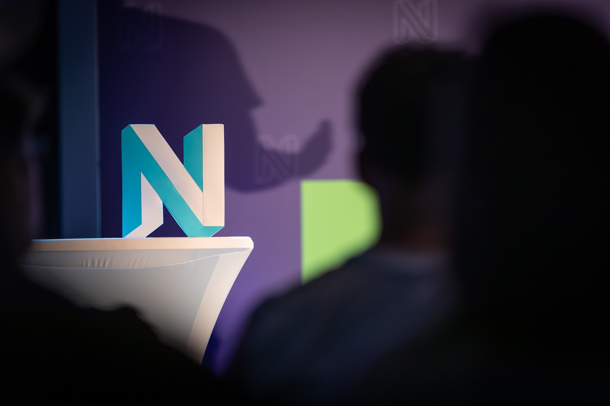 2025-06-18 Neos Conference.jpg The Neos logo with an ElePHPant shadow
