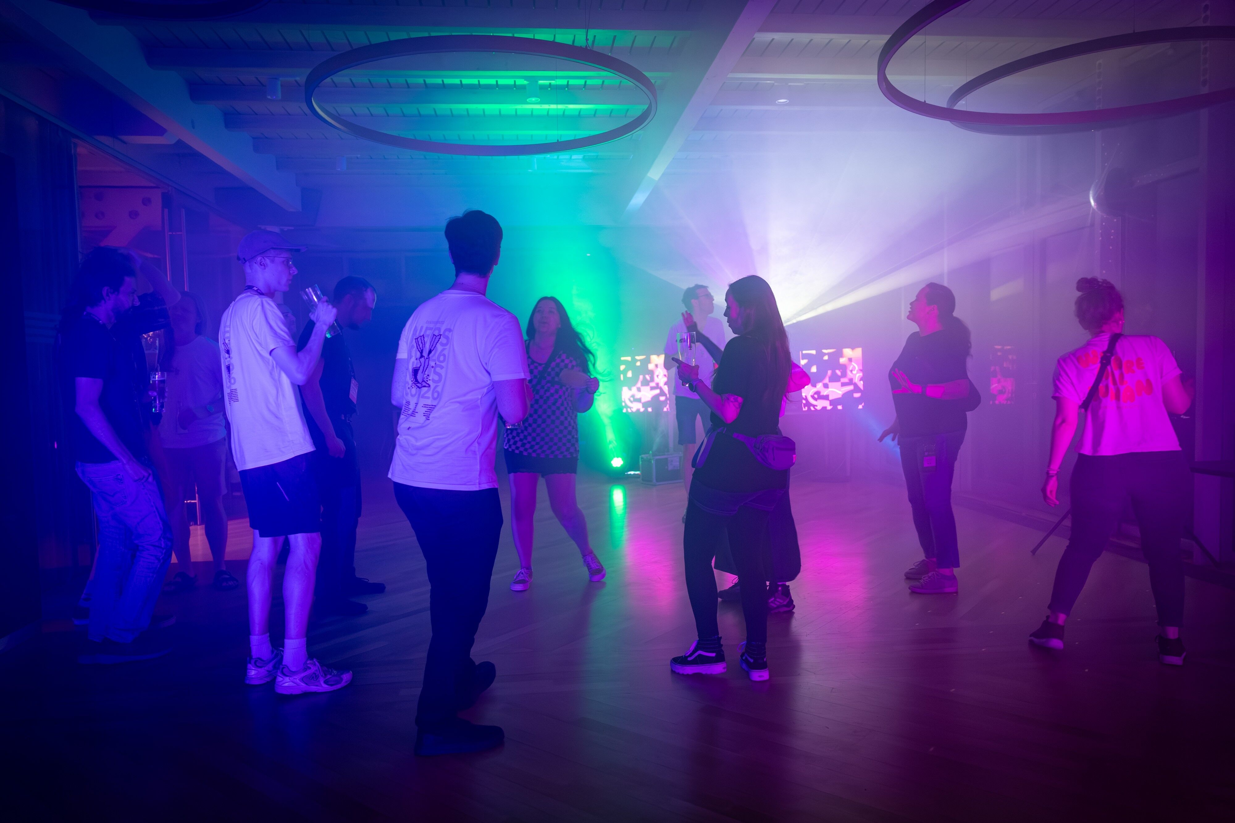 People dancing at the social event